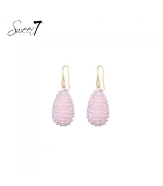 Oorbellen met roze kralen met een ovale hanger