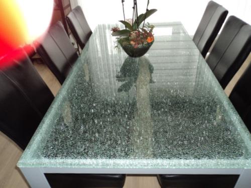 Te koop mooie crash glazen eettafel +salontafel met metalen poten grijs