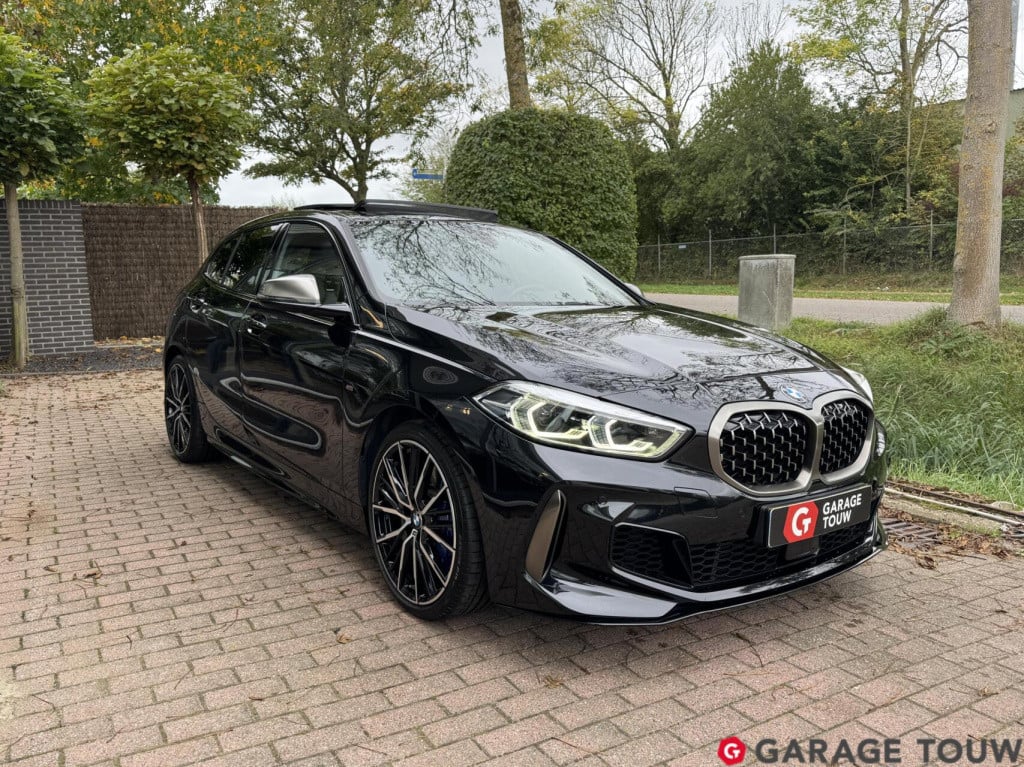 BMW 1 Serie m135i xdrive high executive edition pano orig.nl
