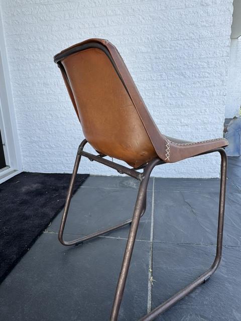 8 stuks lederen eetkamerstoelen