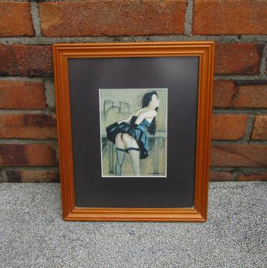 Ingelijste tekening van een vrouw