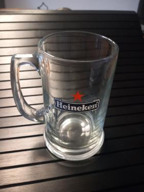 Heineken halve liter Bierglas Pul jaren 60. Heeft grote rode 5 punt ster