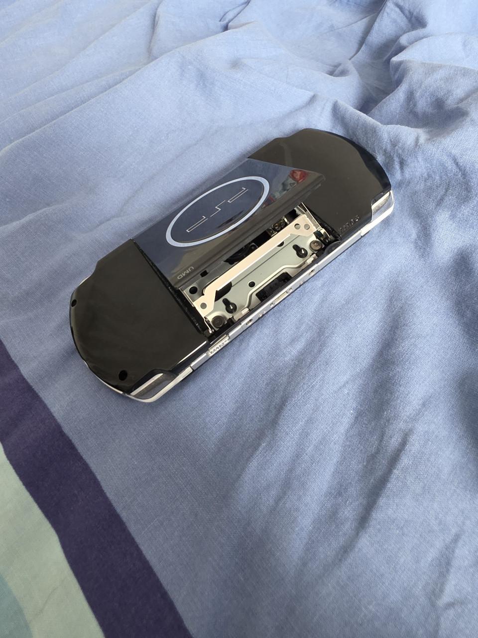 Psp/playstation portable met hoes.
