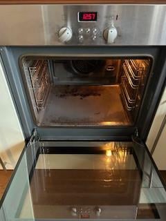 Oven , 5 pits gaskookplaat en afzuigkap