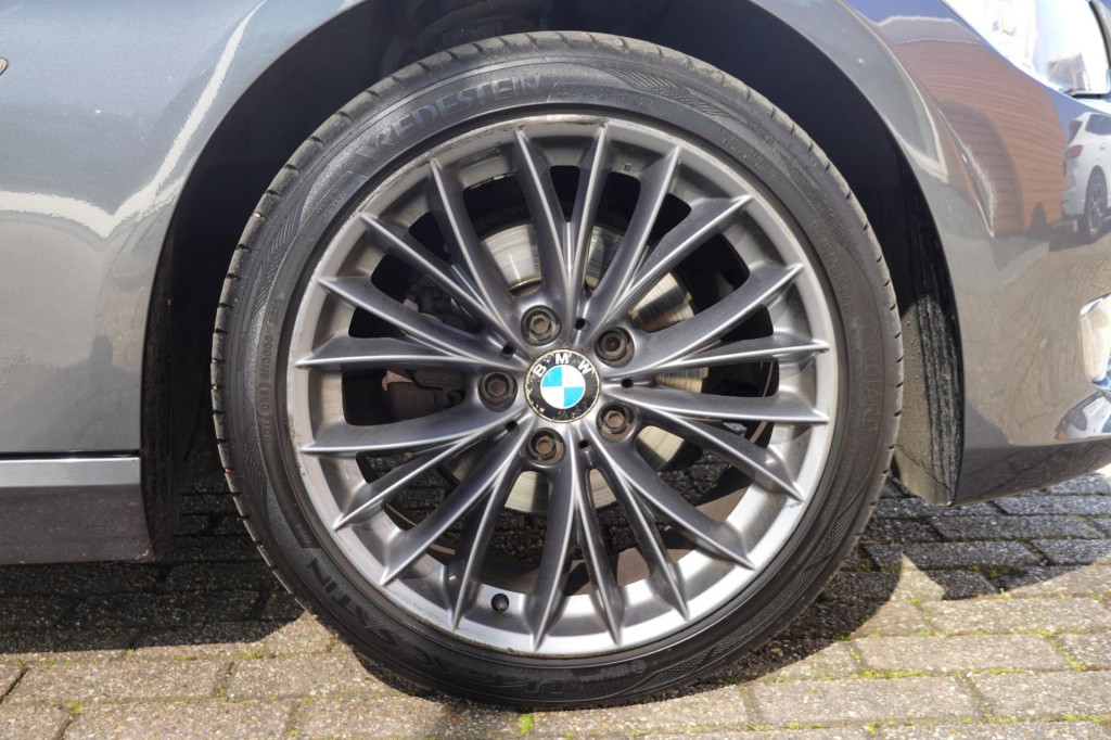 BMW 3-serie coupé 320i corporate lease business line sport