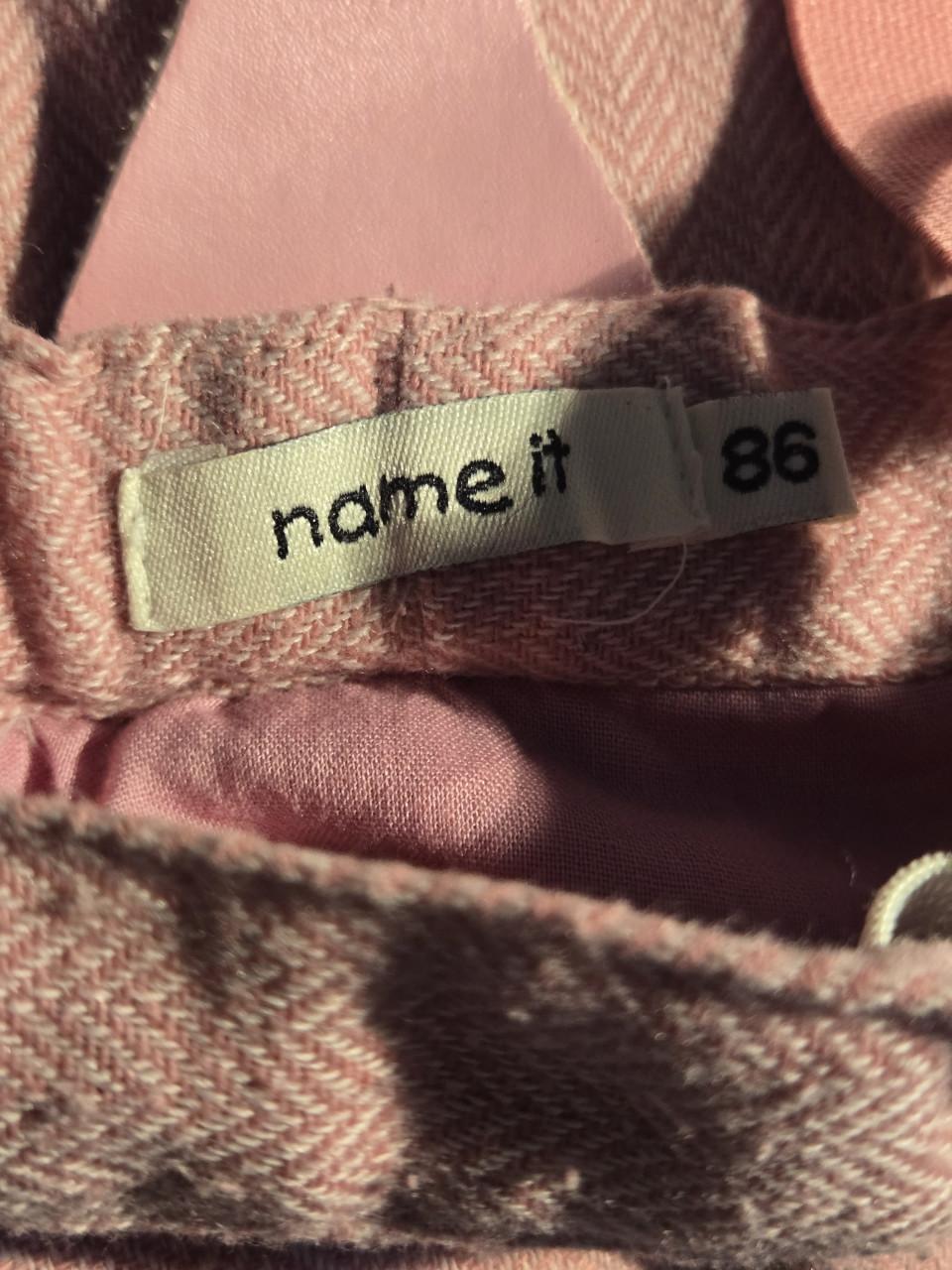 Roze geplooide rok met bretels. name It Maat 86