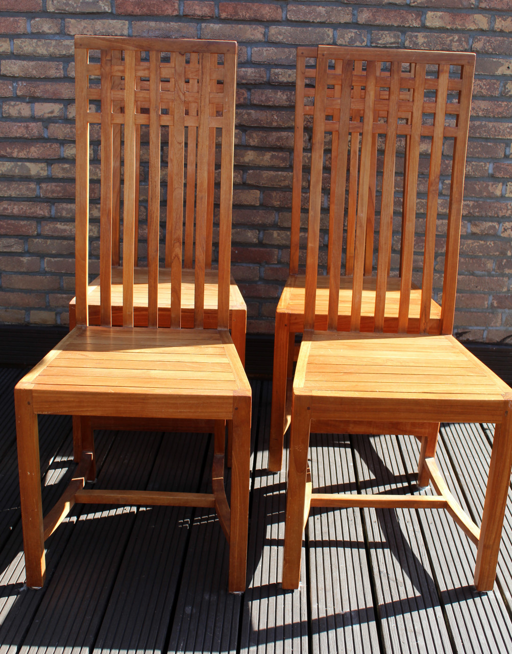 8 teak stoelen