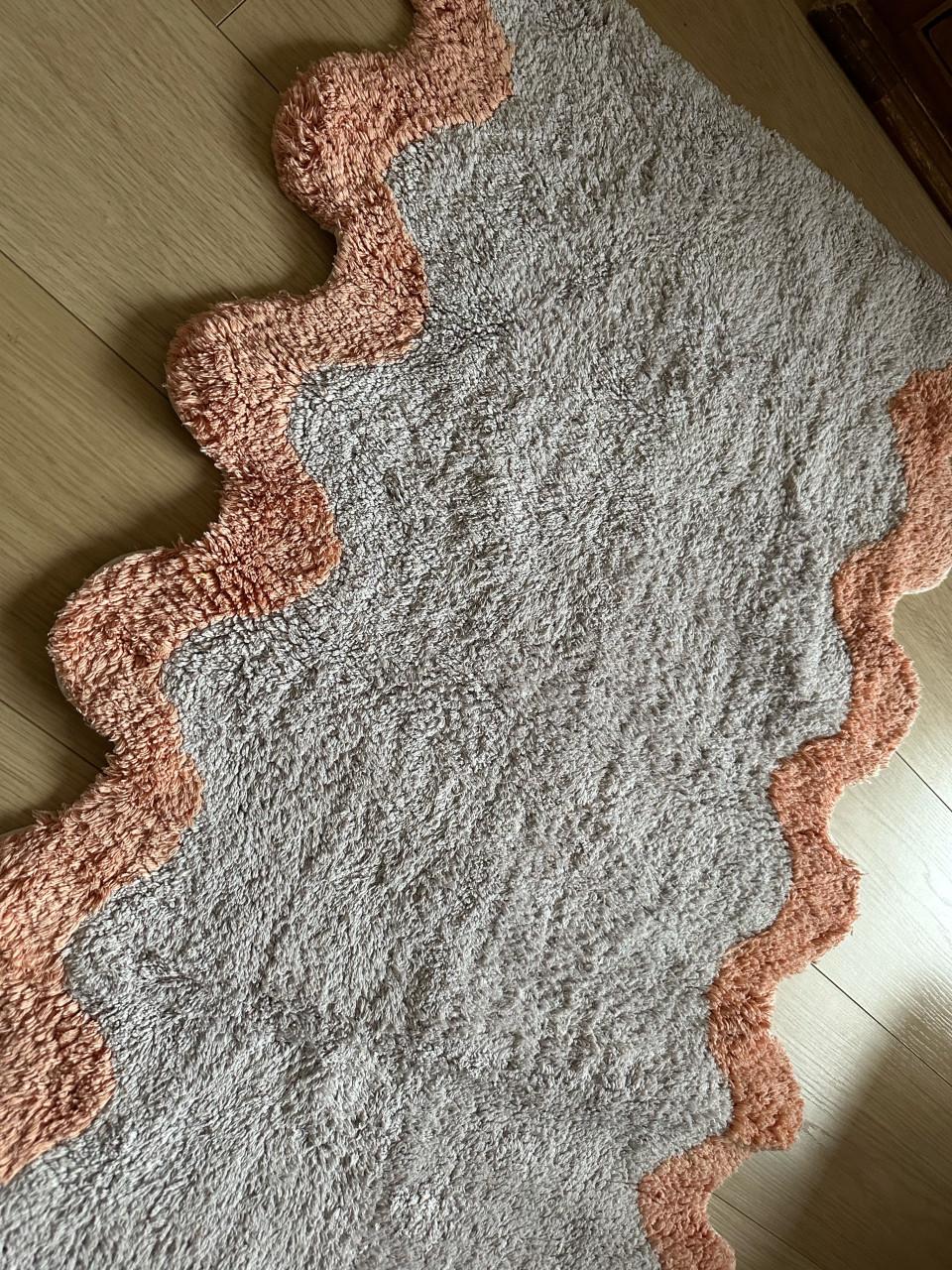 Vloerkleedje met speelse rand