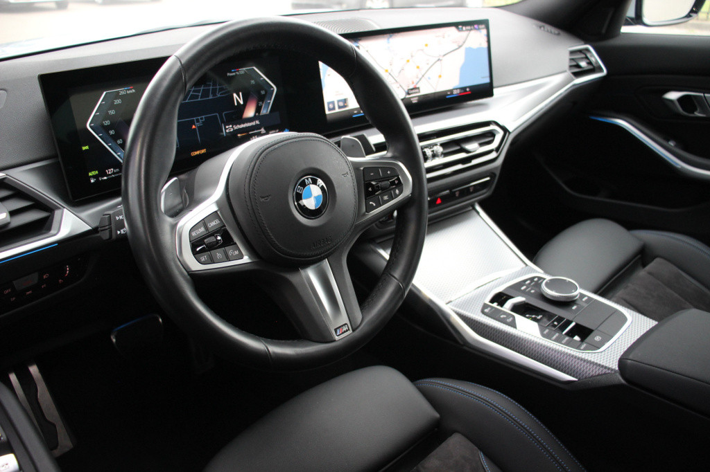 BMW 3-serie 320i m-sport | schuifdak | 20'' styling 795m | el trekhaak