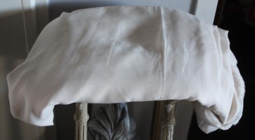 Grote lap voetingstof gladde stof creme kleur