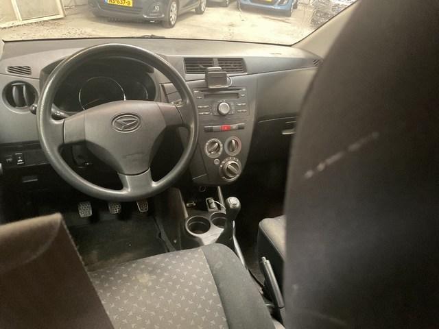 Daihatsu Cuore 1.0 airco | nap | ned. auto met boekjes | kleur zwart etc.