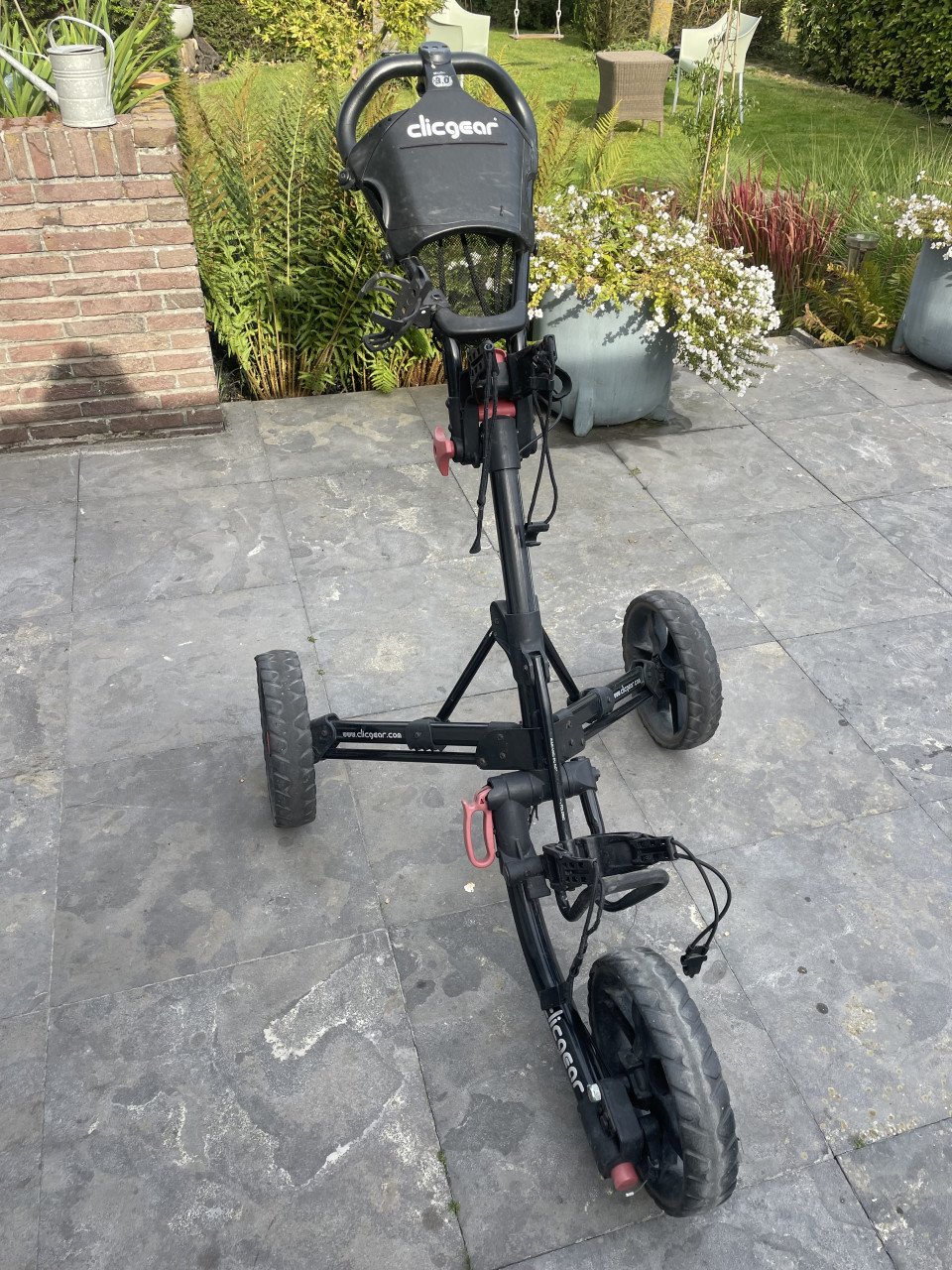 Mooie set golfclubs met golfwagen