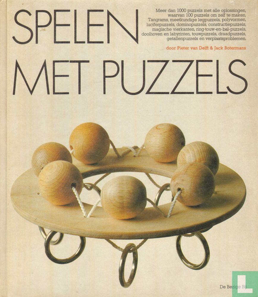 Boek: Spelen met puzzels 1e druk 1978 In zeer nette staat.