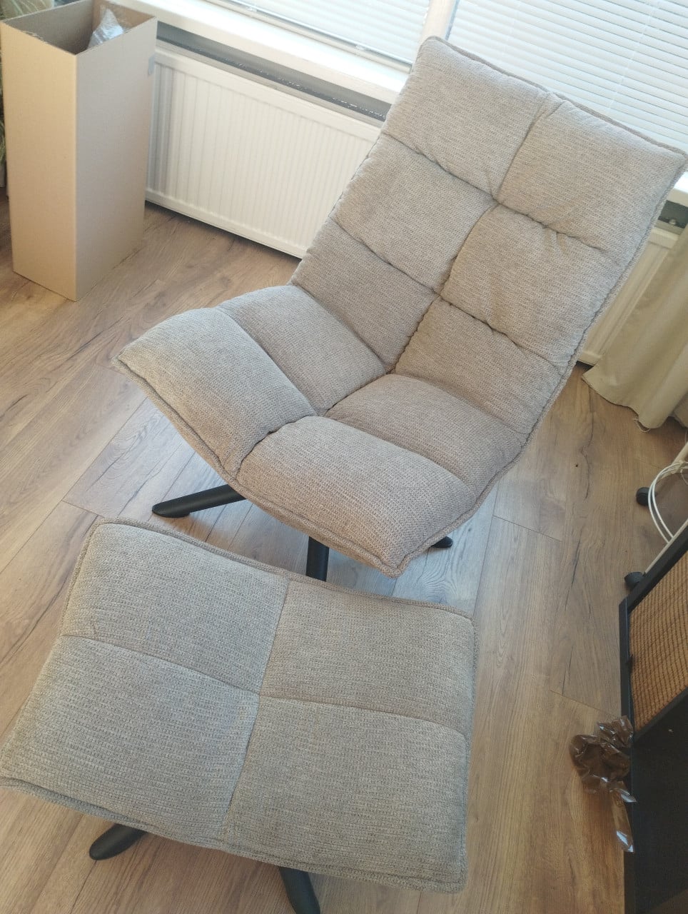 Draaifauteuil met voetenbank