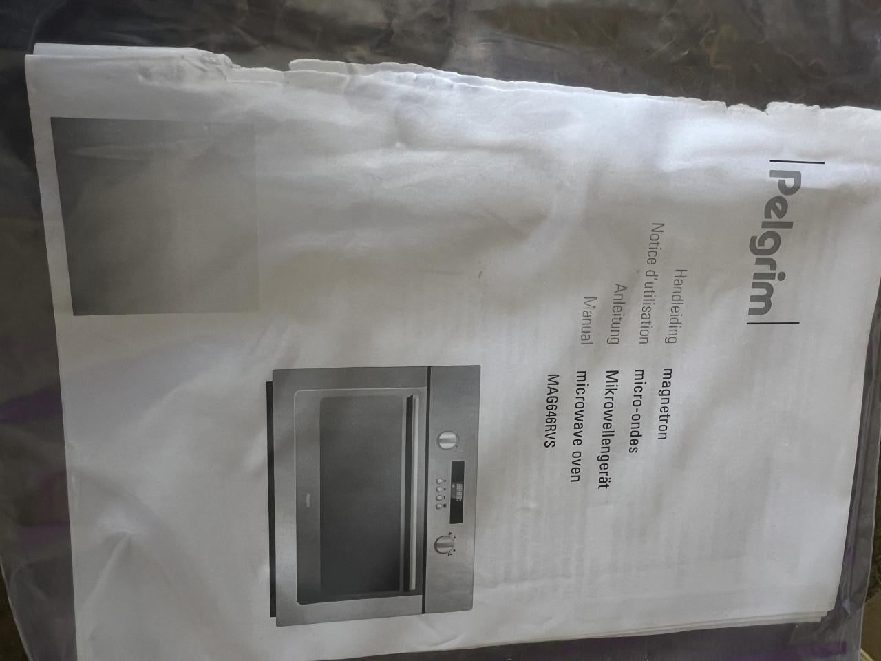 Inbouw Magnetron 60 cm. Breed als nieuw met gebruiksaanwijzing