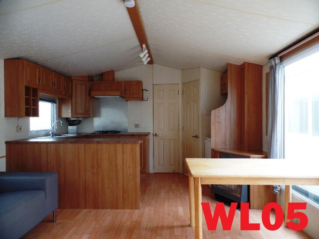 Stacaravans en chalets met middenkamer tot 6 pers te koop