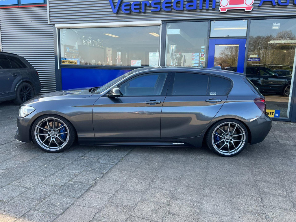 BMW 1 Serie m135i xdrive high executive, customized, stage 2 437 pk!