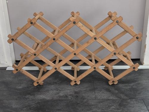 Vintage houten uittrekbaar wijnrek voor 10 flessen.