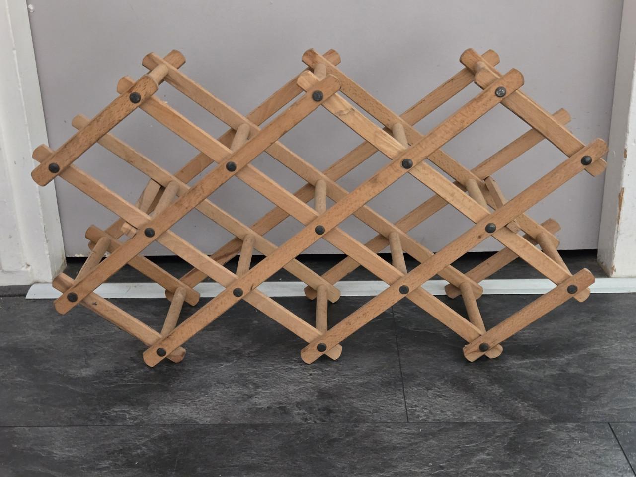 Vintage houten uittrekbaar wijnrek voor 10 flessen.