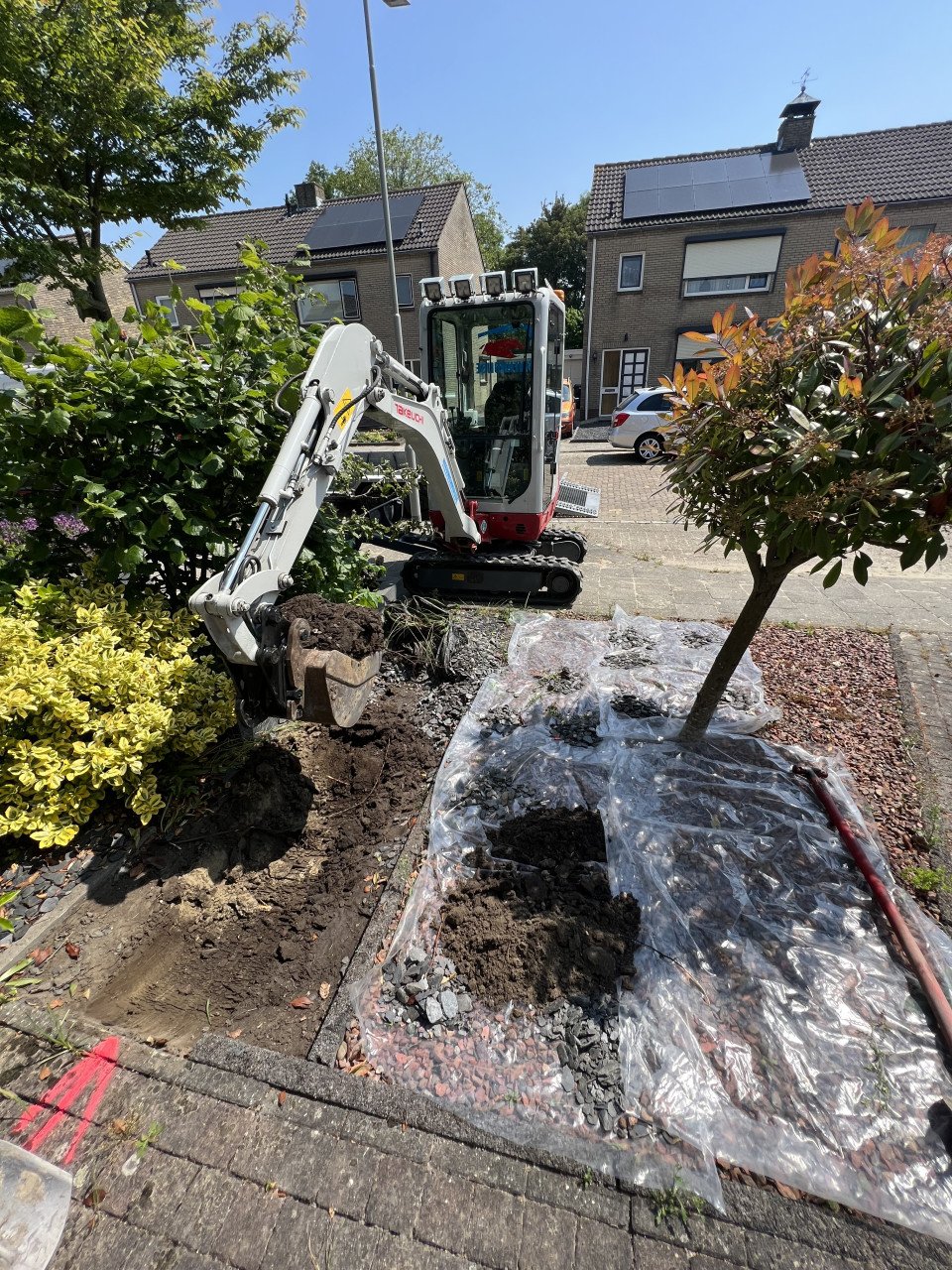 Graafwerk | Tuin afgraven | minigraver met machinist