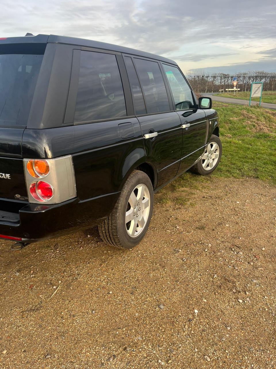 Land Rover 2004 Zwart, roestvrij!