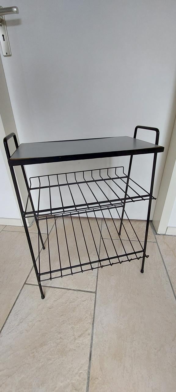 Vintage lectuurbak van zwart metaal met formica blad