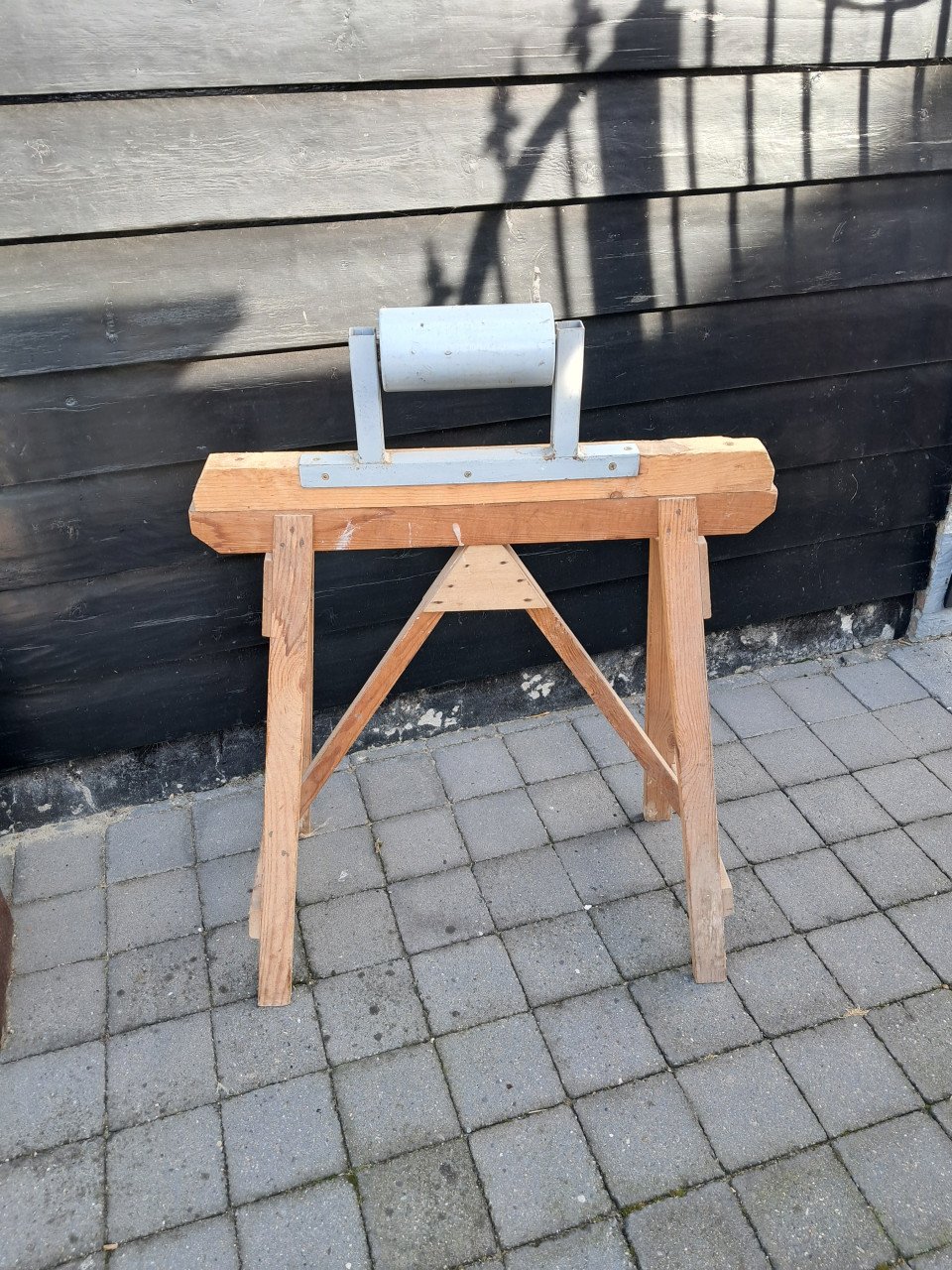 Schraag met rol.