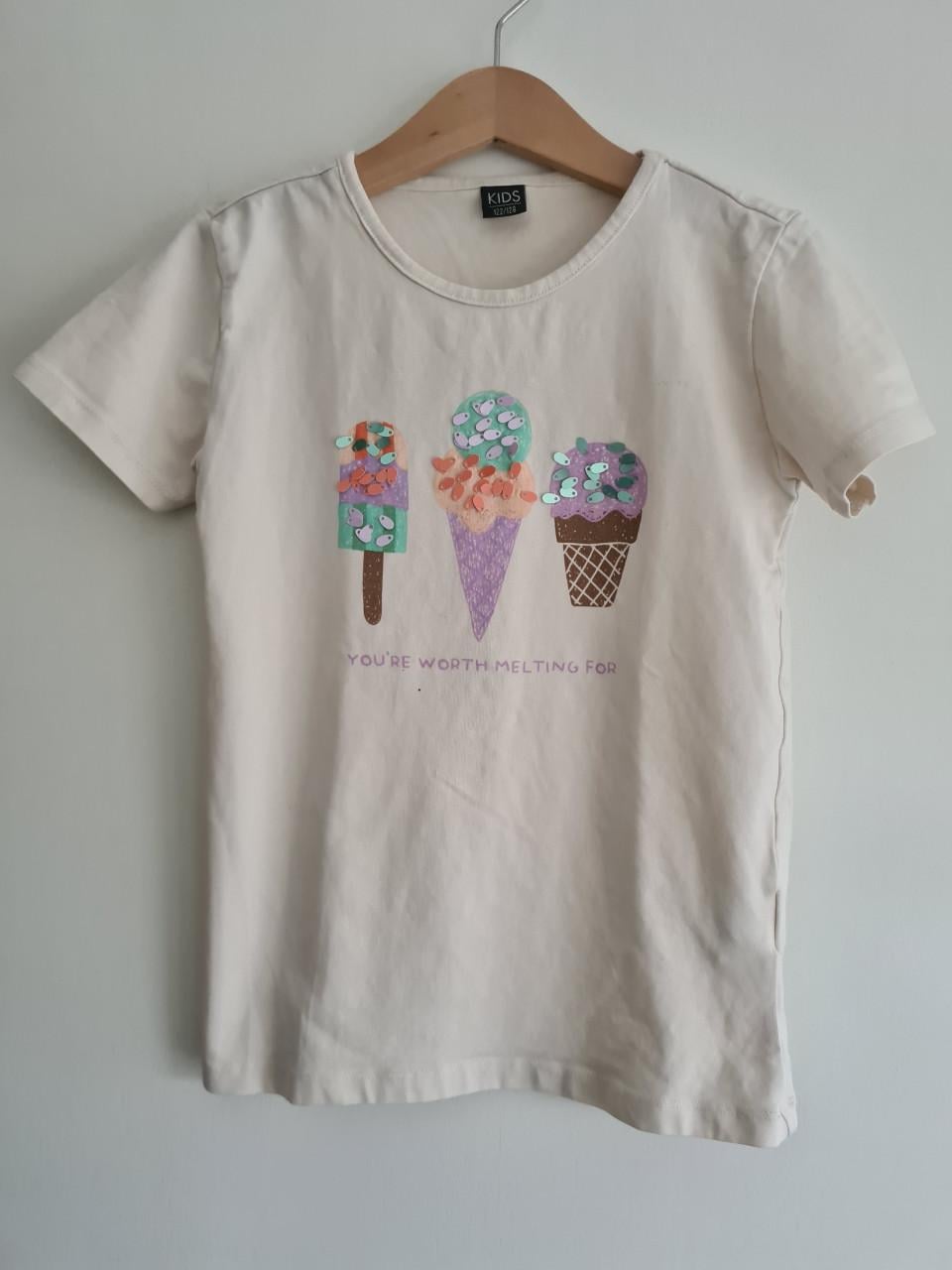 Crème,beige shirt met applicatie van Kids Maat 122-128