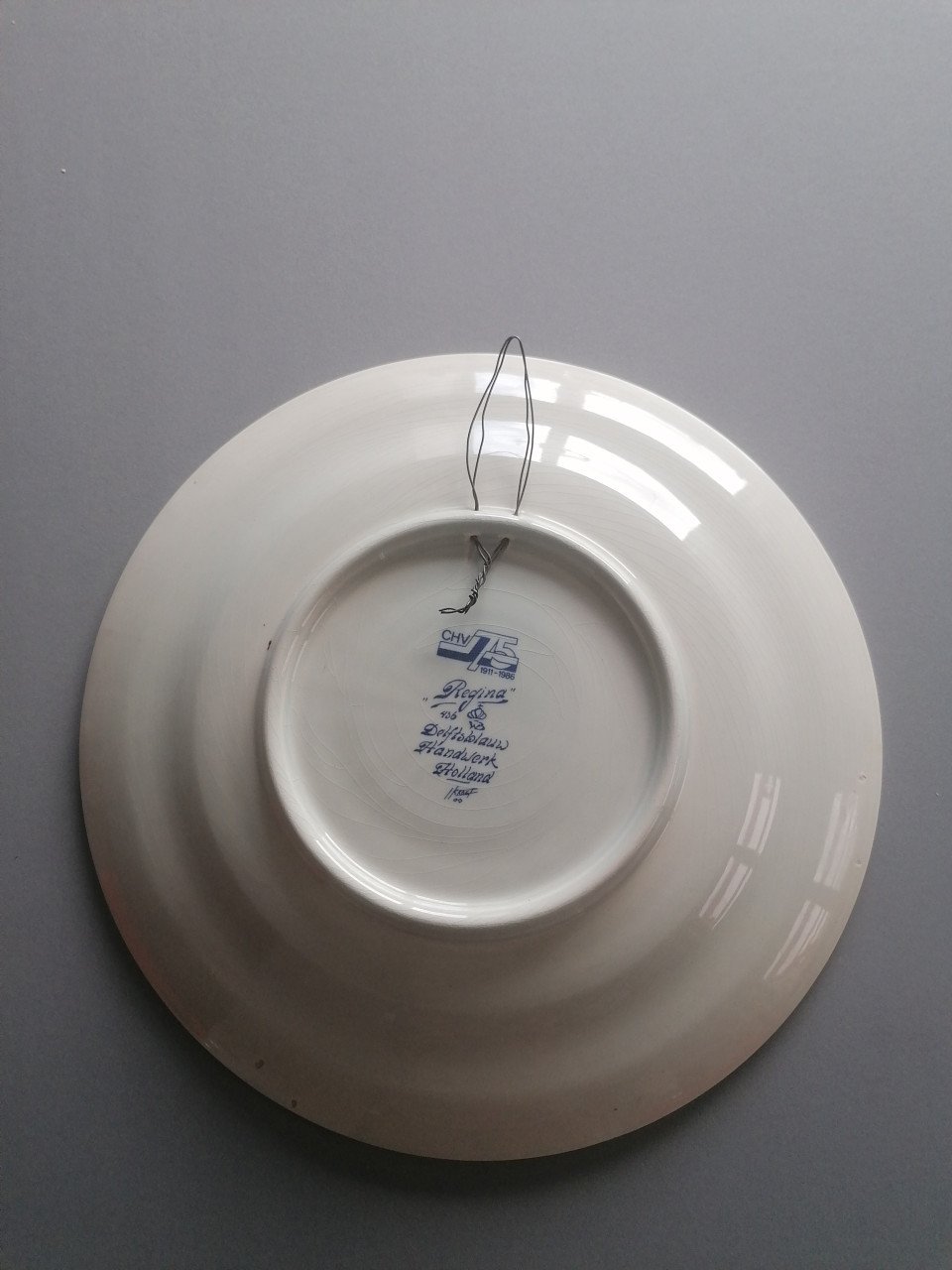 Origineel Delfts blauw bord 75 jaar chv