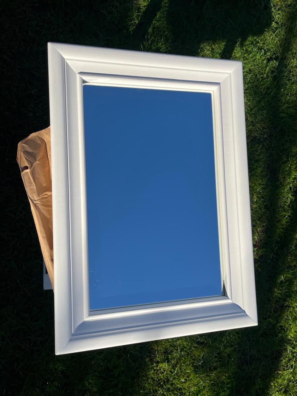 Spiegel met facet in houten lijst 53x38 cm buitenmaat