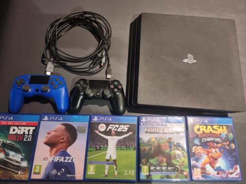 Playstation 4 Pro inc. 5 games en 2 controllers