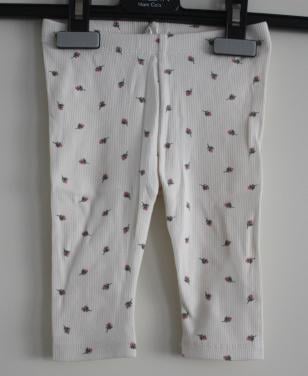 Witte legging met bloemen print maat 68