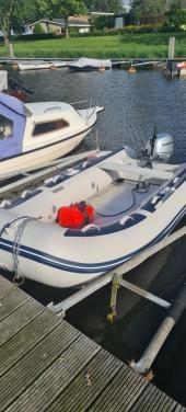 Rubberboot + 8pk motor