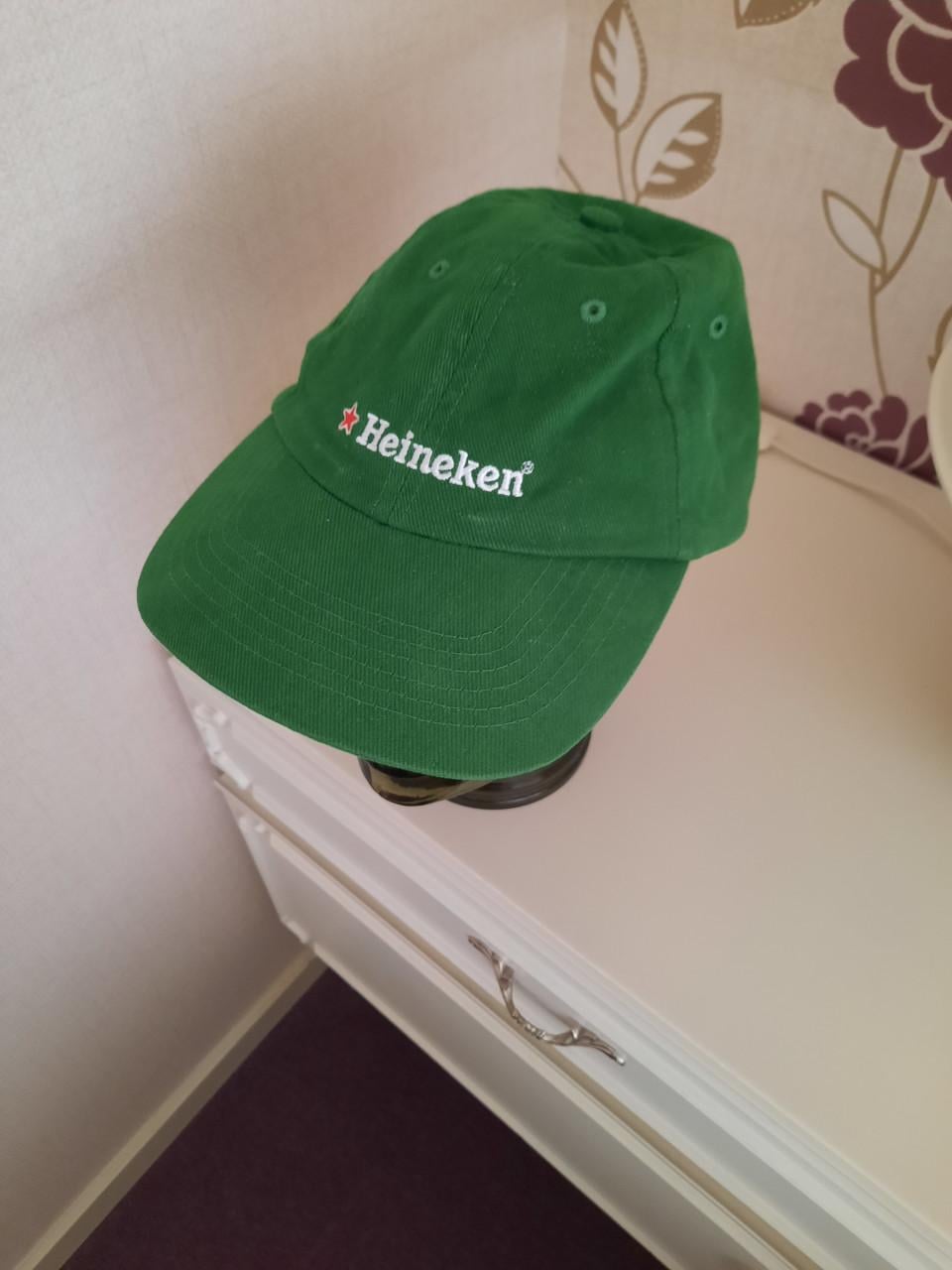 Plunjezak HEINEKEN en handdoekje en petje,