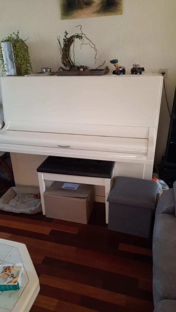 Witte piano te koop