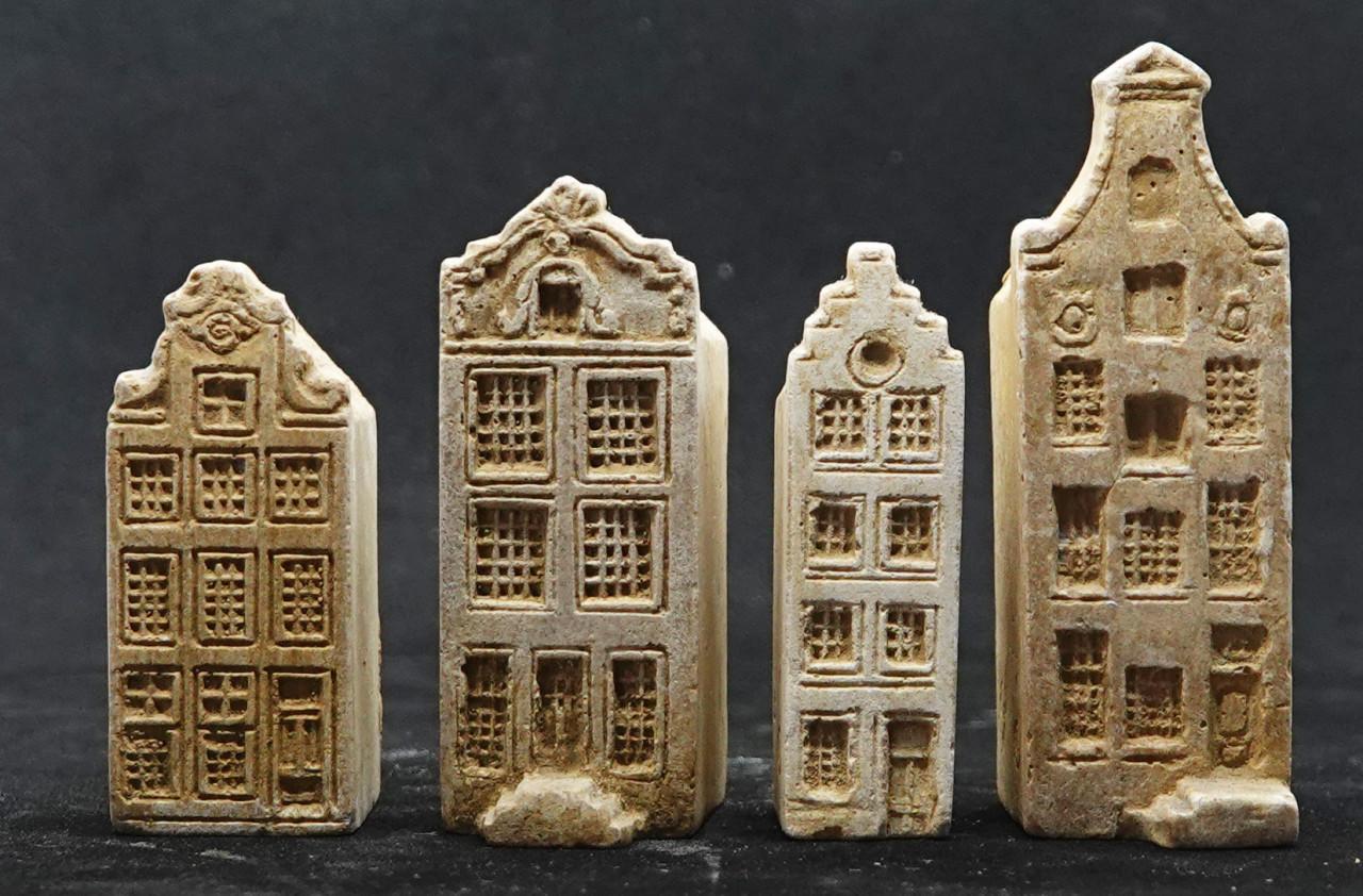 4 miniatuur grachtenhuisjes Amsterdam, serie copyright