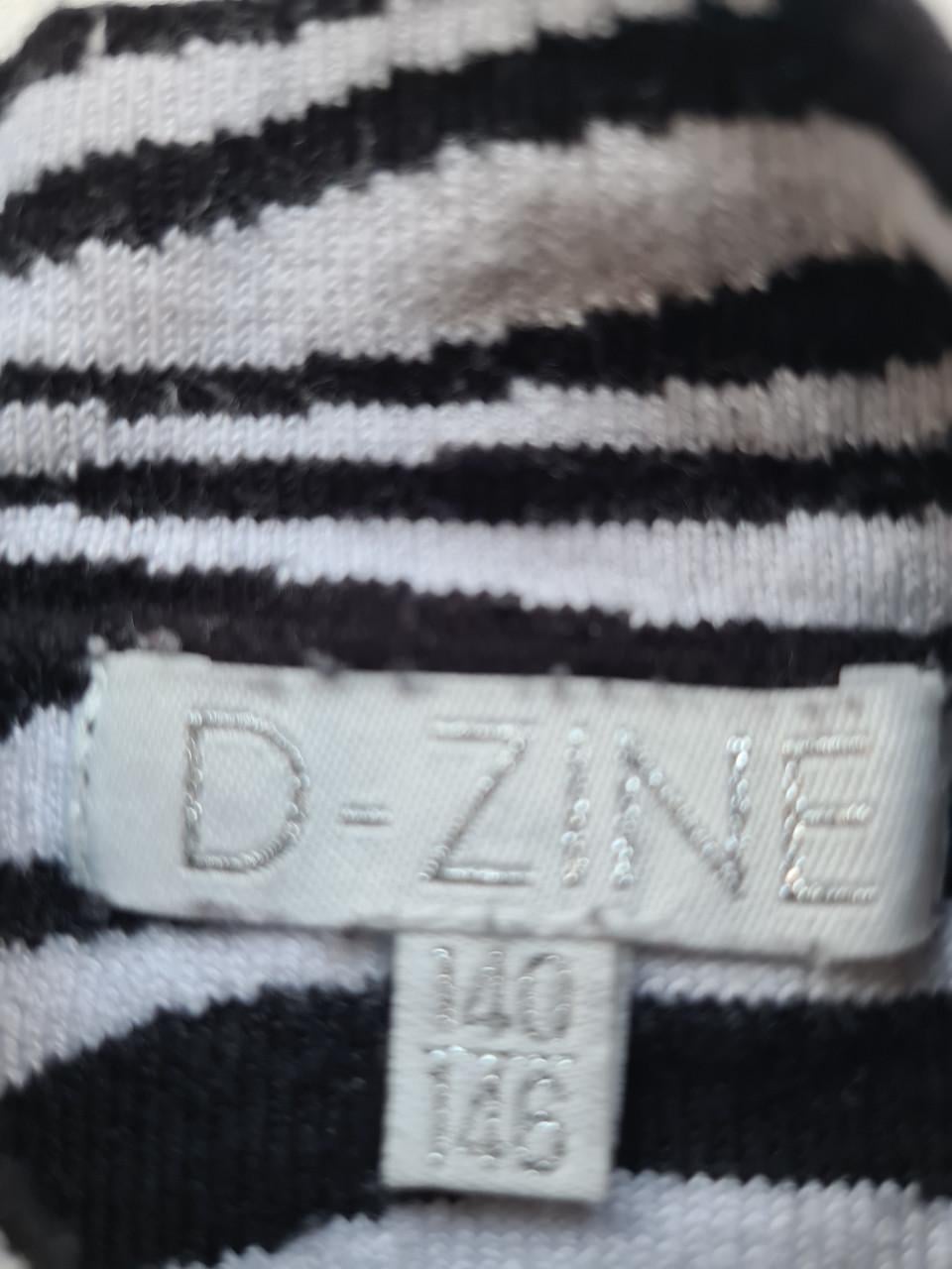 Leuk zwart-wit truitje van D-Zine met een trendy zebraprint. Mt 146-152