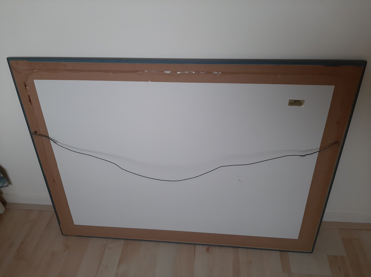 Grote houten lijst met poster in passe partout.