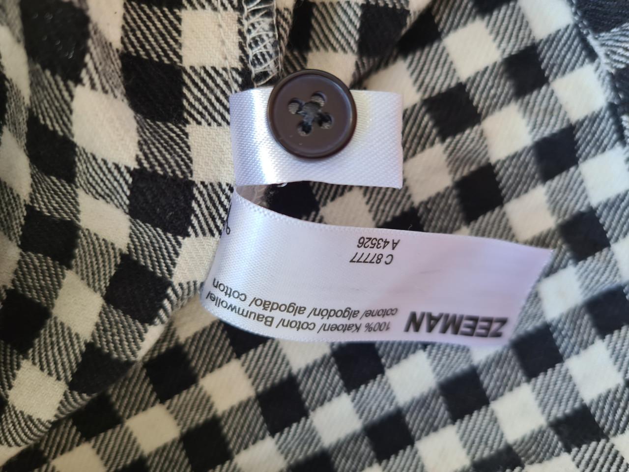 Zwart-wit geblokt jurkje met roezel van Zeeman  Maat 134-140