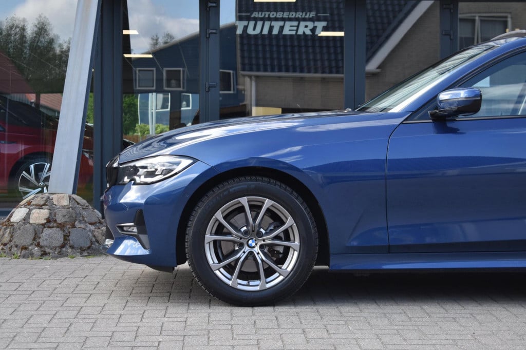 BMW 3-serie 320i high executive | harman kardon | schuif kanteldak | leder 