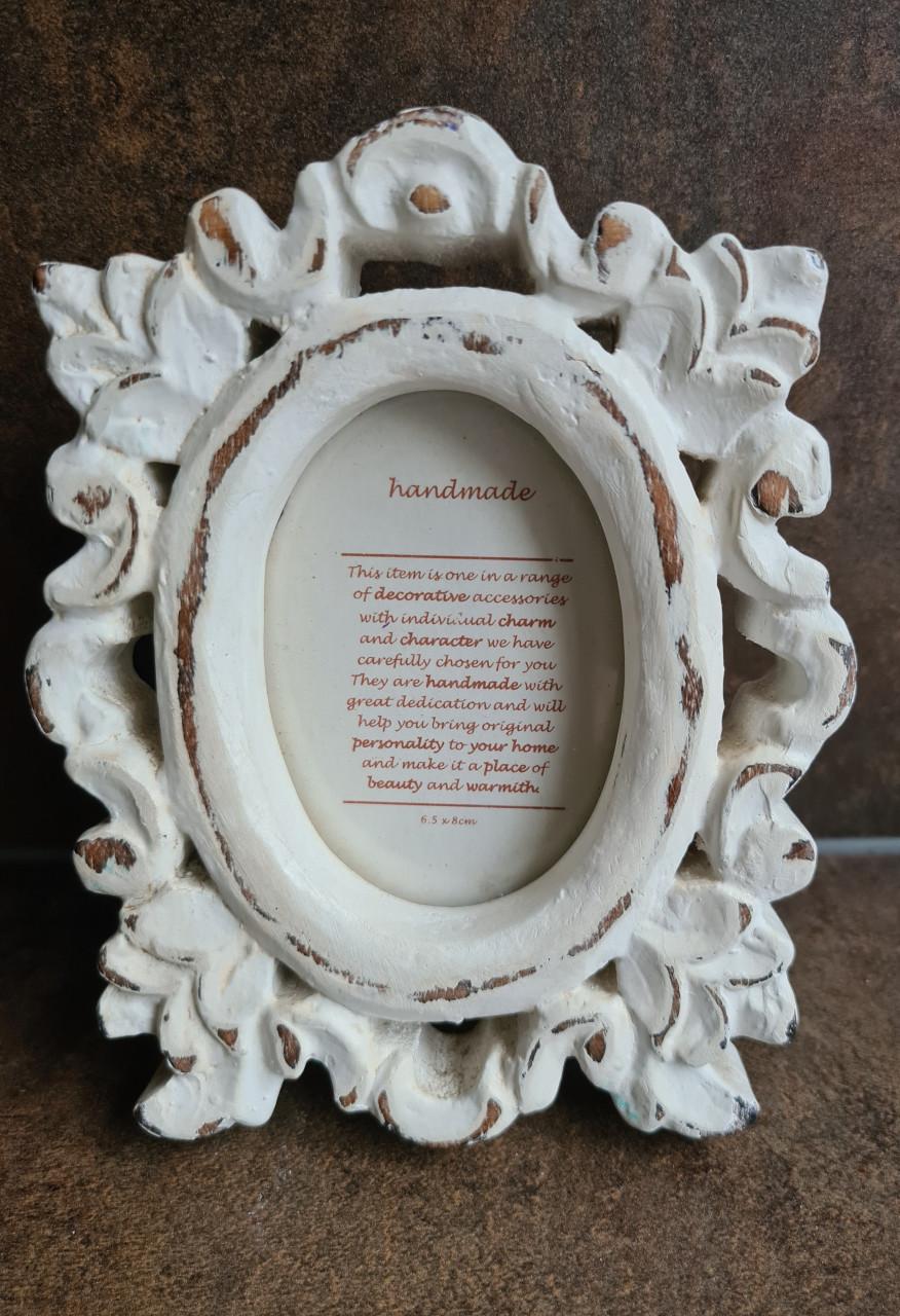 Prachtige handgemaakte fotolijst in brocante stijl.