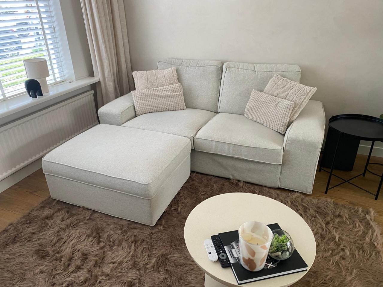 Beige Bank met Hooker