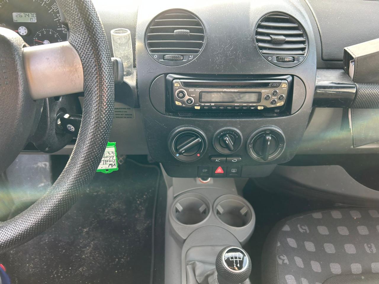 Volkswagen New Beetle 1.6 Loopt beetje onregelmatig rijd voor de rest nrml