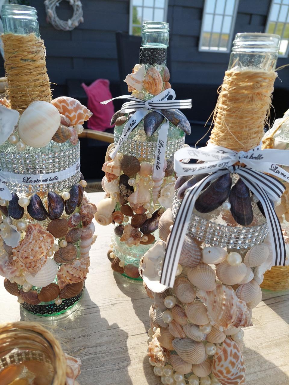 Unieke schelpen flessen decoratie