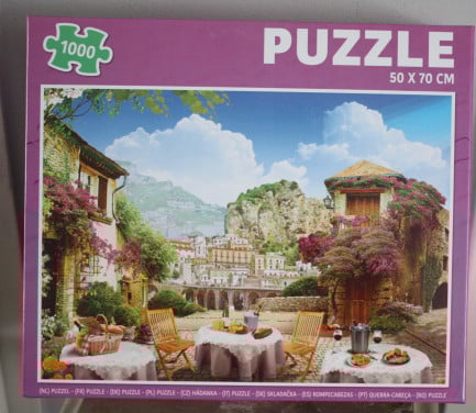 Puzzel 1000 stukjes paarse doos