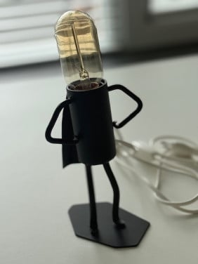 Smeedijzeren lampje (man met cape)