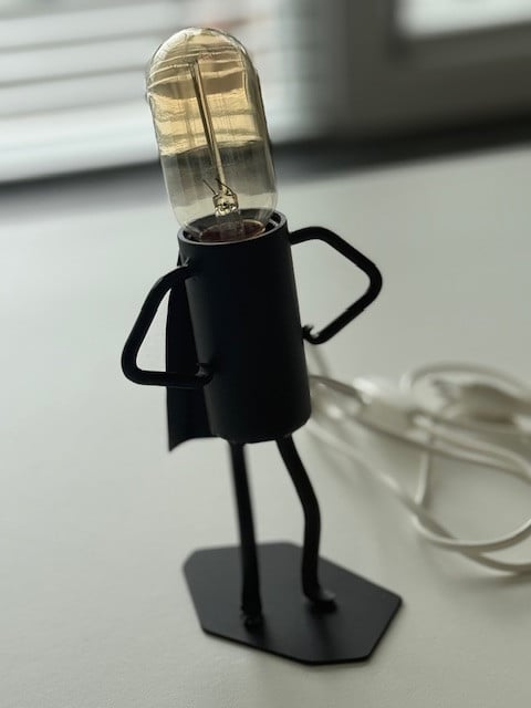 Smeedijzeren lampje (man met cape)