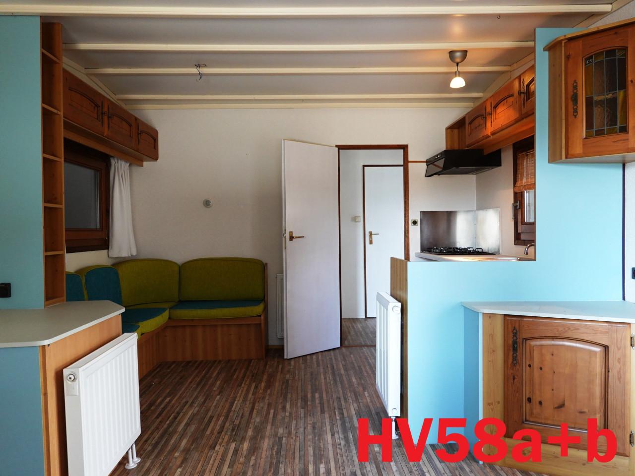 Edelweisz L-chalet met hardhouten kozijnen met dubbel glas en CV te koop