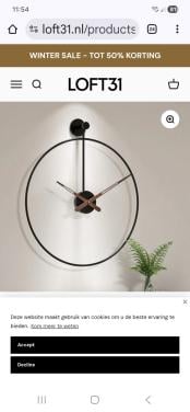 Metalen moderne wandklok.