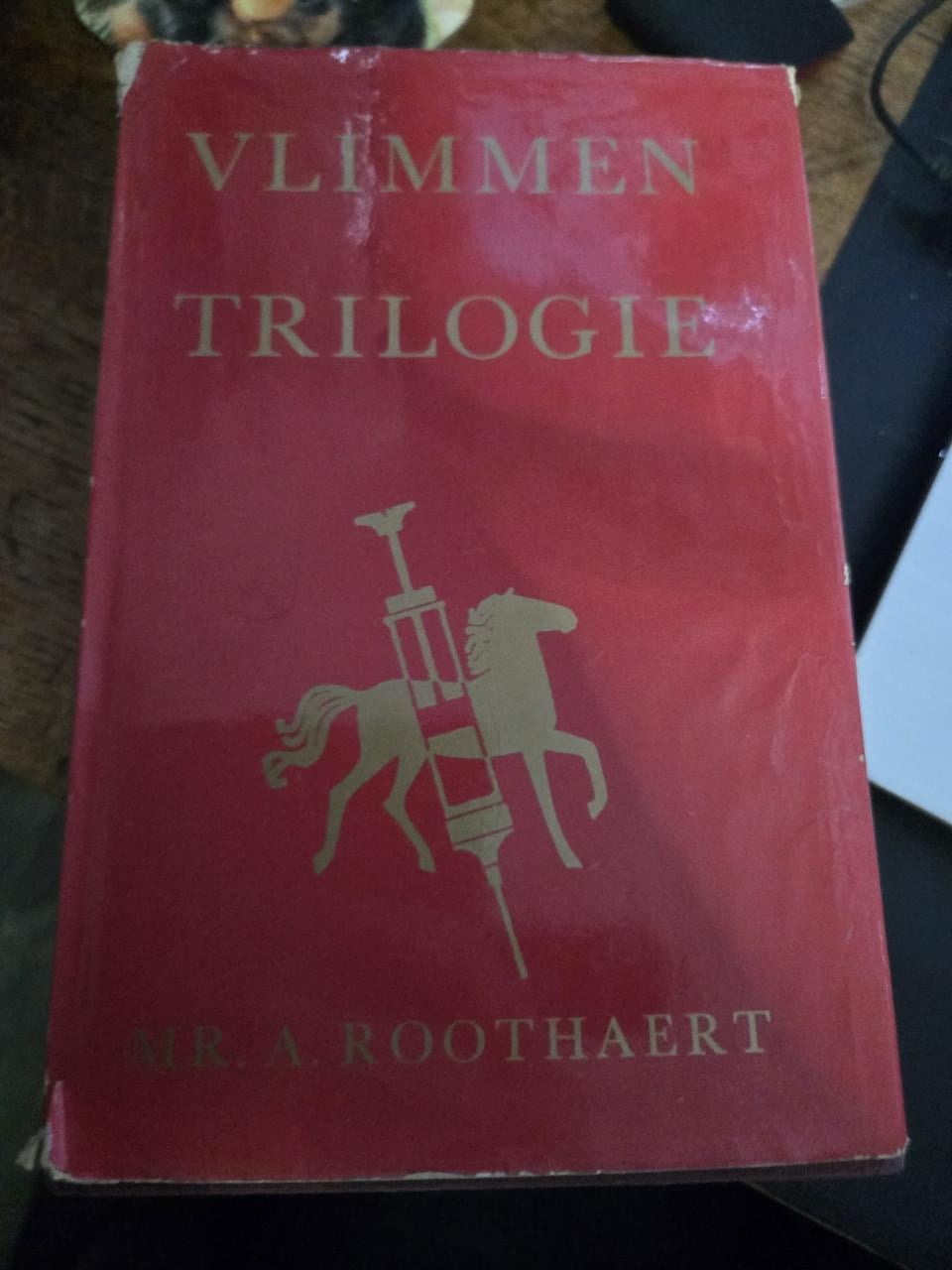 Boek:Vlimmen trilogie geschreven door Mr. A. Roothaert. 1971